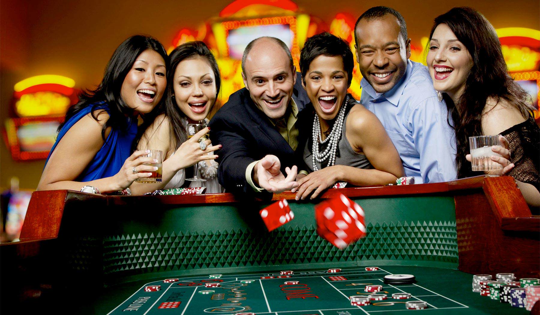 Images of people enjoying gambling at Clearwater Casino